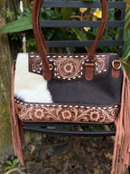 The Frontier Fringe Carryall | Cowhide, tooling, fringe, and function. Includes concealed carry pocket and two ways to wear