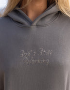 God's Still Working Unisex Hoodie