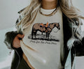 Pretty Girls Ride Pretty Horses Graphic on Gildan Softstyle Natural Shirt – Graphic Tee, Long Sleeve & Crewneck.